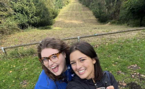two people stood at the top of a hill